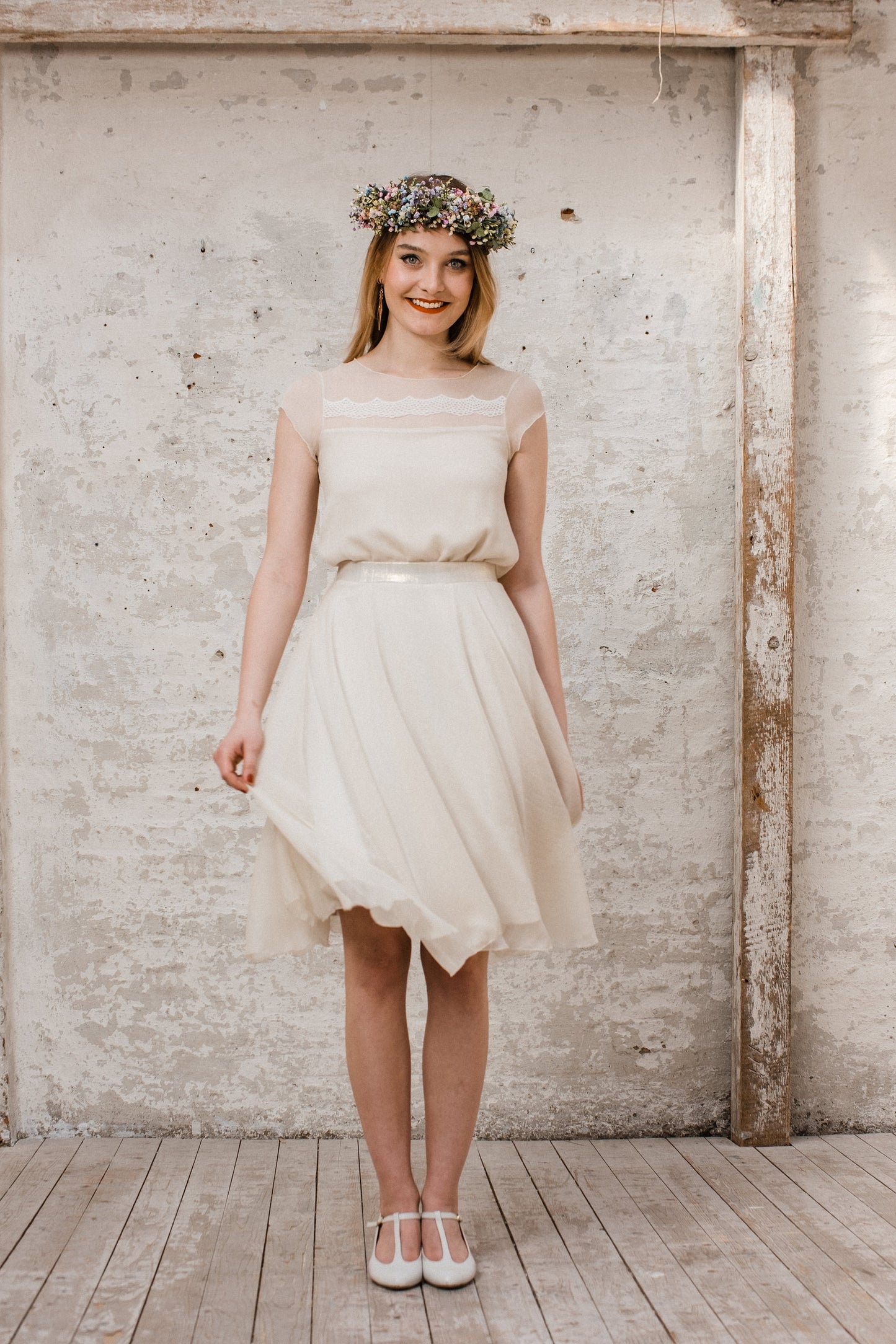 Wolkig leichtes, cremefarbenes Brautkleid