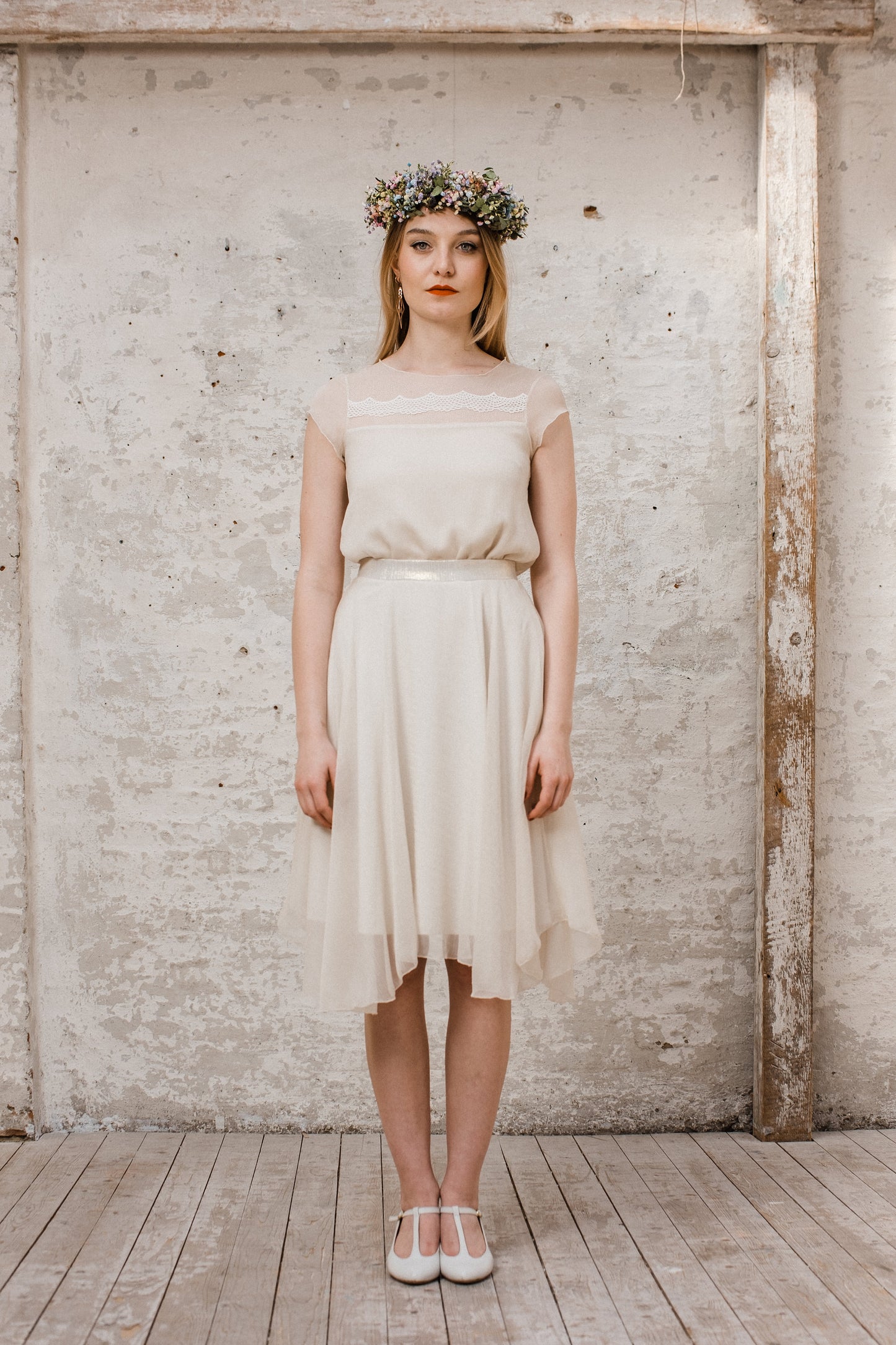 Wolkig leichtes, cremefarbenes Brautkleid